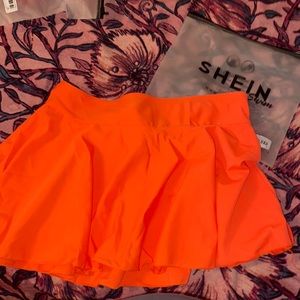 Orange swimsuit skirt